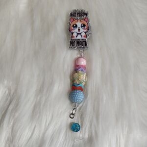 Glow In The Dark Kitten Beaded Badge Reel.